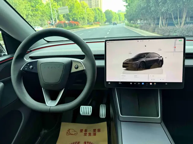 Tesla Model Y — Фото автомобиля 15