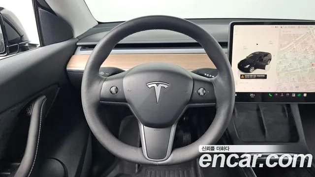 Tesla Model Y — Фото автомобиля 11