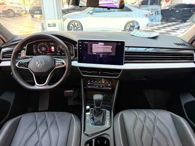 Volkswagen Tiguan L — Фото автомобиля 5