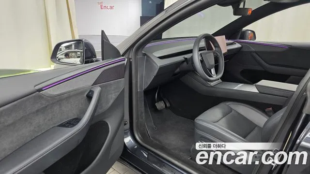 Tesla Model Y — Фото автомобиля 15