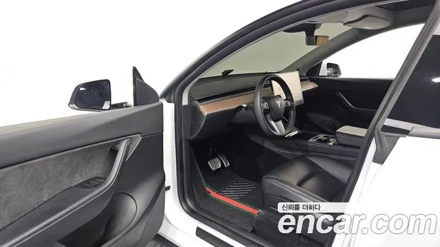 Tesla Model Y — Фото автомобиля 10