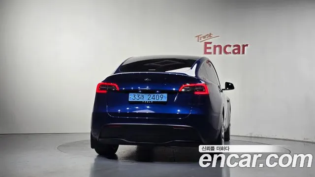 Tesla Model Y — Фото автомобиля 4