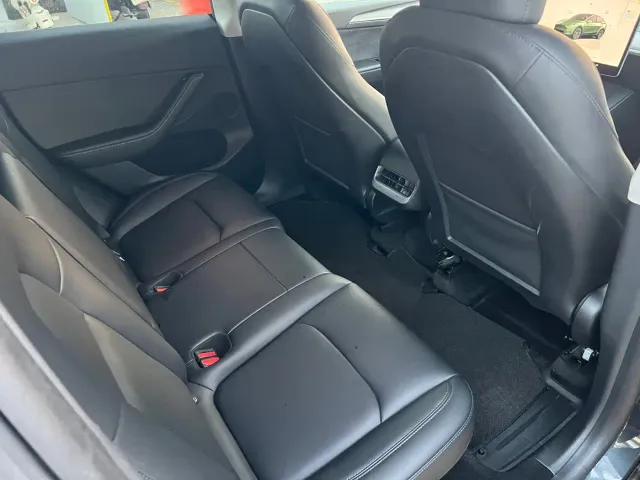 Tesla Model Y — Фото автомобиля 11
