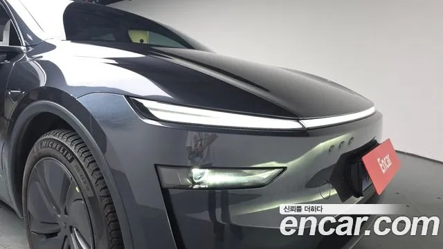 Tesla Model Y — Фото автомобиля 4