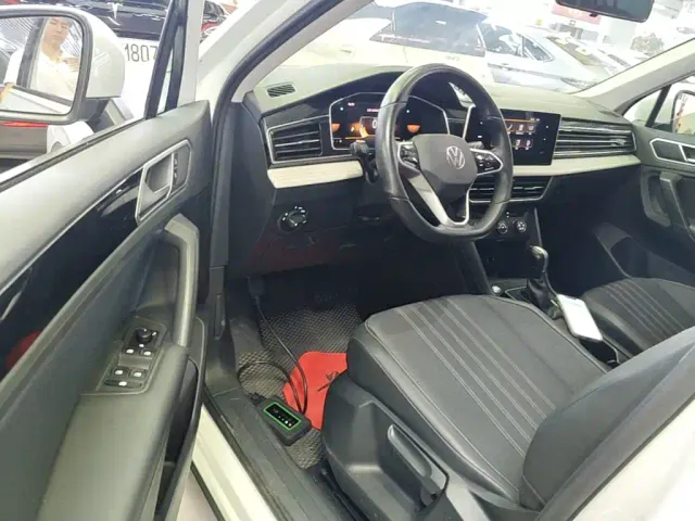 Volkswagen Tiguan L — Фото автомобиля 15
