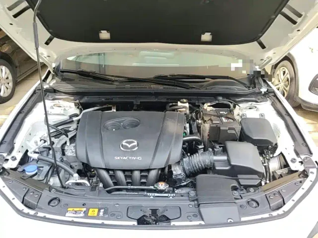 Mazda Axela — Фото автомобиля 19