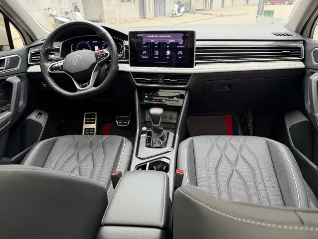 Volkswagen Tiguan L — Фото автомобиля 6