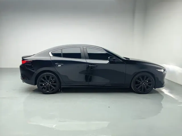 Mazda Axela — Фото автомобиля 11