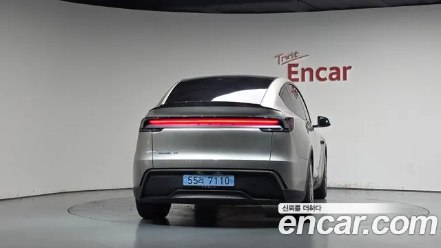 Tesla Model Y — Фото автомобиля 4