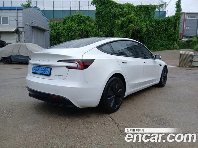 Tesla Model 3 — Фото автомобиля 4