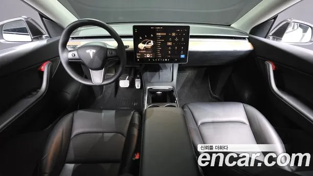 Tesla Model Y — Фото автомобиля 10