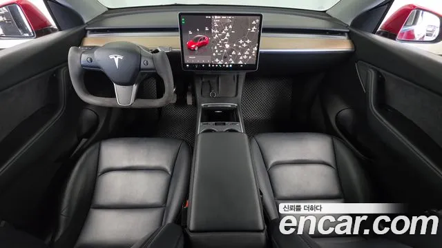 Tesla Model Y — Фото автомобиля 10