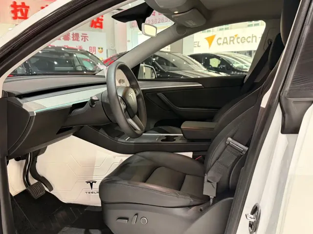 Tesla Model Y — Фото автомобиля 7