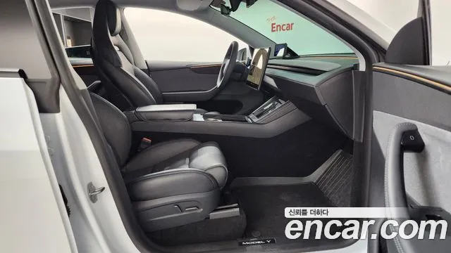 Tesla Model Y — Фото автомобиля 5