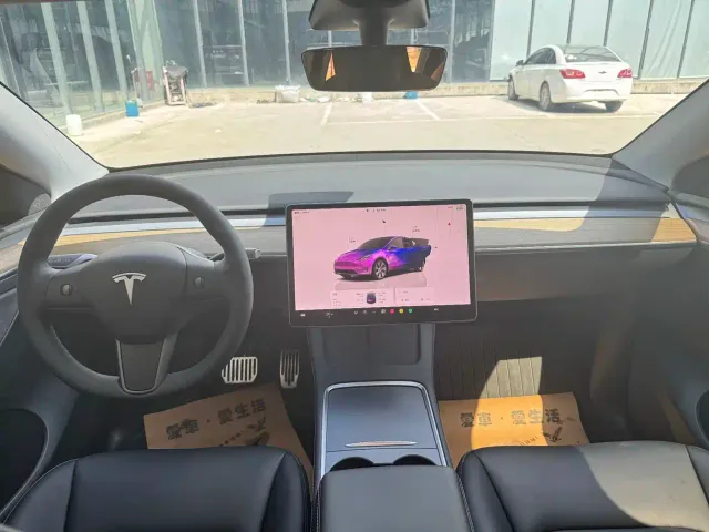 Tesla Model Y — Фото автомобиля 10