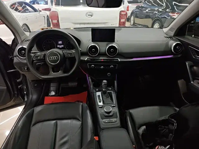 Audi Q2L — Фото автомобиля 9
