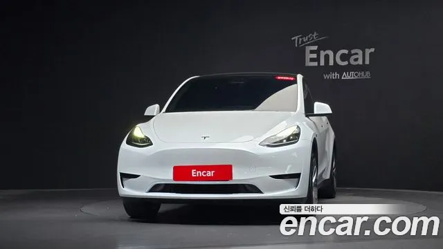 Tesla Model Y — Фото автомобиля 3