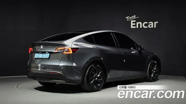 Tesla Model Y — Фото автомобиля 2