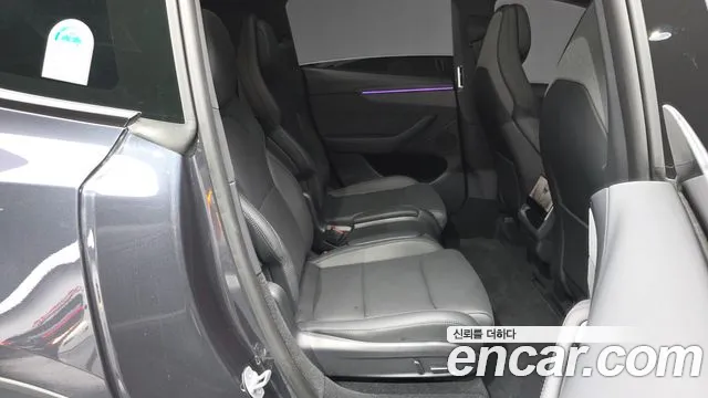 Tesla Model Y — Фото автомобиля 10
