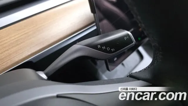 Tesla Model Y — Фото автомобиля 12
