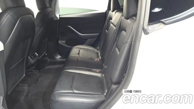 Tesla Model Y — Фото автомобиля 9