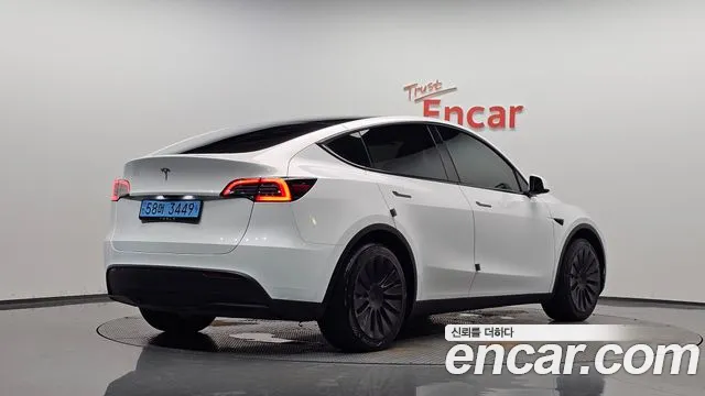 Tesla Model Y — Фото автомобиля 2