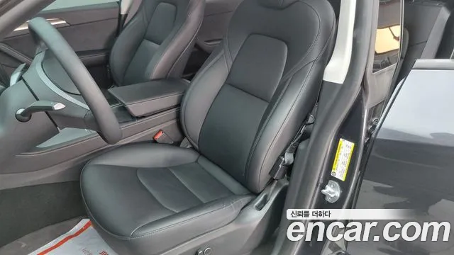 Tesla Model Y — Фото автомобиля 15