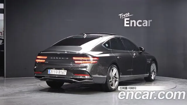 Genesis G80 Бензин 2.5 турбо AWD — Фото автомобиля 2