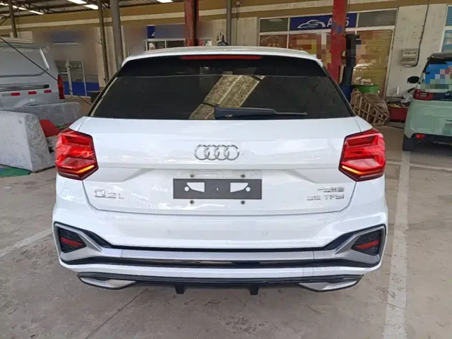 Audi Q2L — Фото автомобиля 5