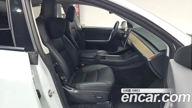 Tesla Model Y — Фото автомобиля 16