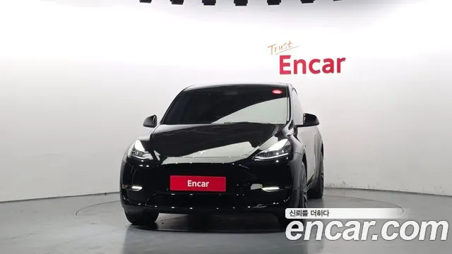 Tesla Model Y — Фото автомобиля 3