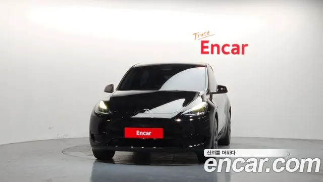 Tesla Model Y — Фото автомобиля 3