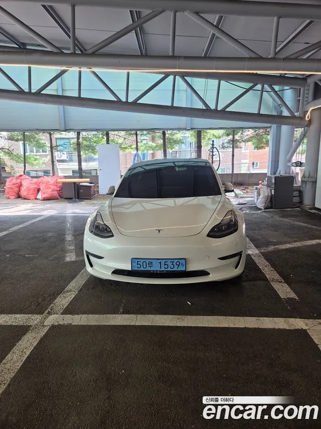 Tesla Model 3 — Фото автомобиля 8