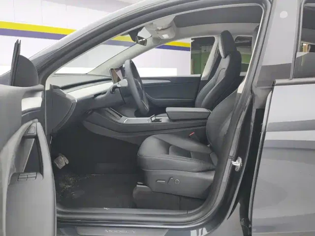 Tesla Model Y — Фото автомобиля 9