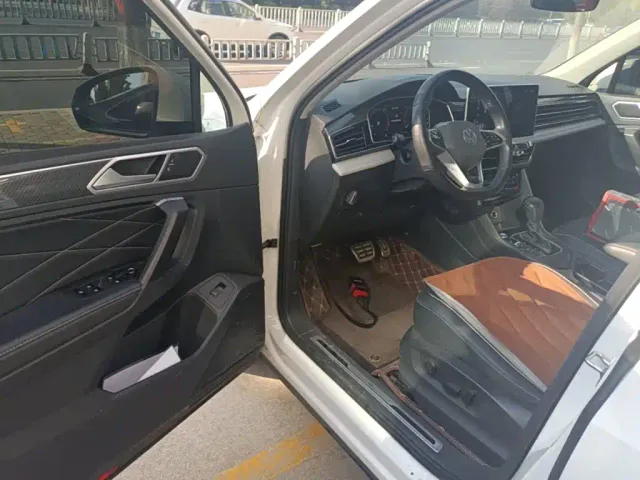 Volkswagen Tiguan L — Фото автомобиля 15