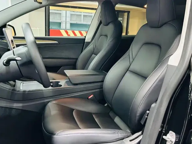 Tesla Model Y — Фото автомобиля 7