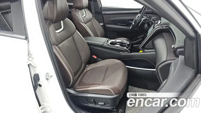 Hyundai Tucson Tucson (NX4) Бензин 1.6 турбо 2WD — Фото автомобиля 12