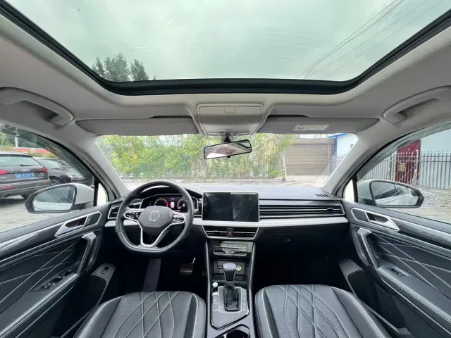 Volkswagen Tiguan L — Фото автомобиля 7