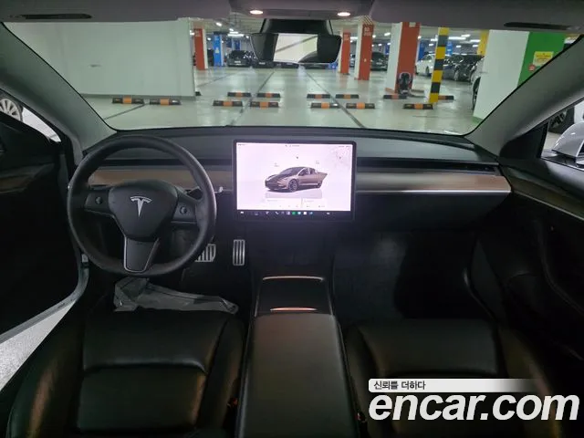Tesla Model 3 — Фото автомобиля 7