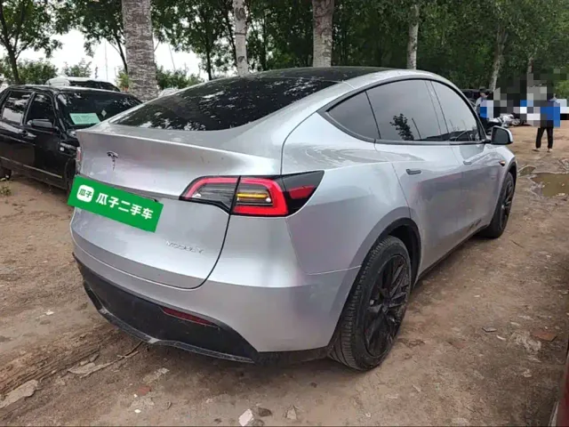 Tesla Model Y — Фото автомобиля 6