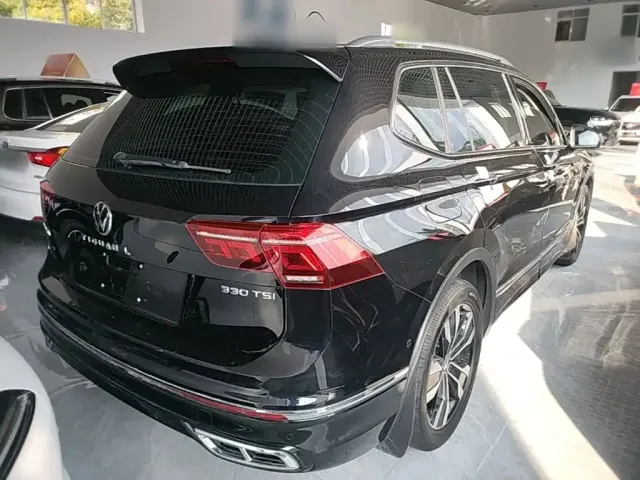 Volkswagen Tiguan L — Фото автомобиля 6