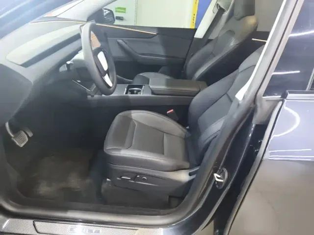Tesla Model Y — Фото автомобиля 14