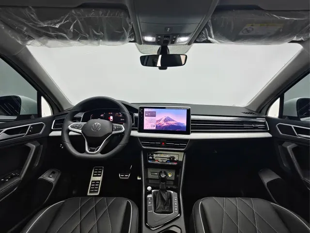 Volkswagen Tiguan L — Фото автомобиля 13