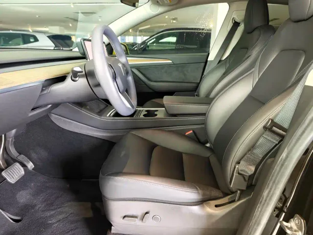 Tesla Model Y — Фото автомобиля 9