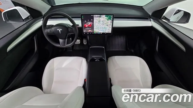 Tesla Model Y — Фото автомобиля 9