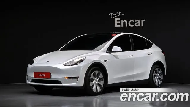 Tesla Model Y — Фото автомобиля 9