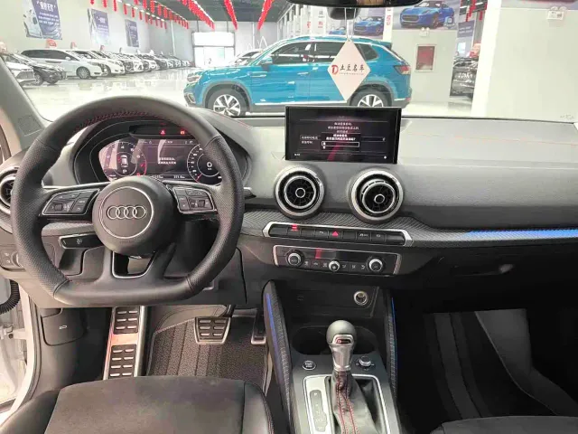 Audi Q2L — Фото автомобиля 9
