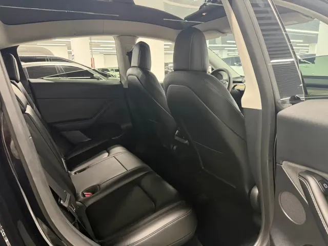 Tesla Model Y — Фото автомобиля 7