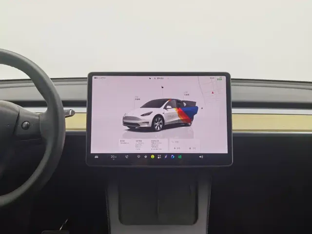 Tesla Model Y — Фото автомобиля 12