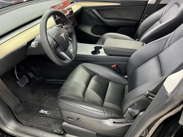 Tesla Model Y — Фото автомобиля 22